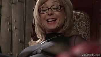 Blonde mature lezdom Nina Hartley in sheer full body lingerie rides face to bound redhead MILF lesbian Maitresse Madeline Marlowe then anal fucks her