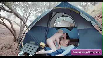 Sexy busty natural lesbo sluts eating pussy in a tent while camping