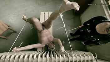 Mistress April punishes her helpless slave in prison